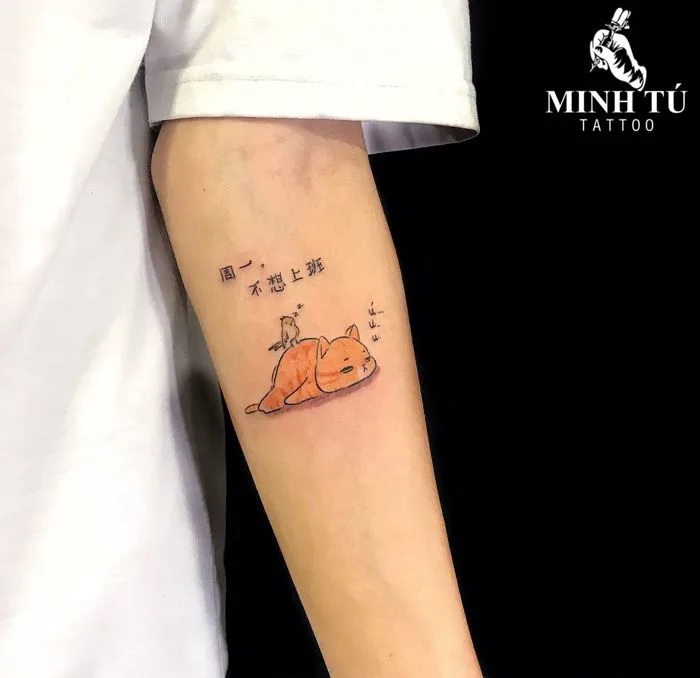 Hình xăm mèo ở bắp tay (3)