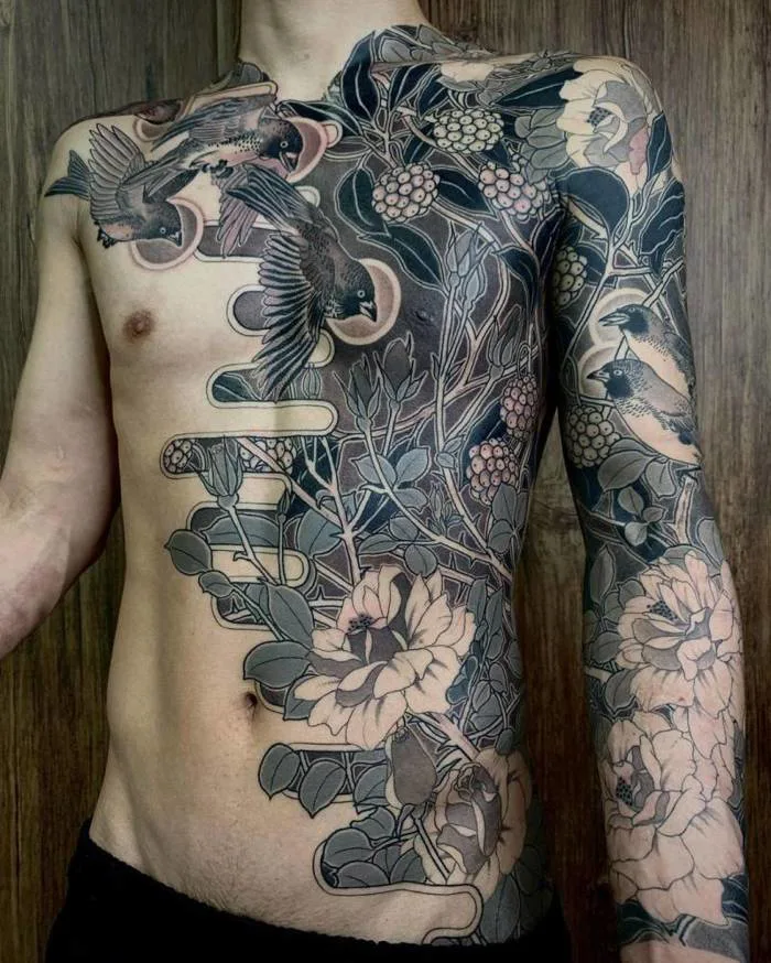 Irezumi tattoo on the torso and arm.
